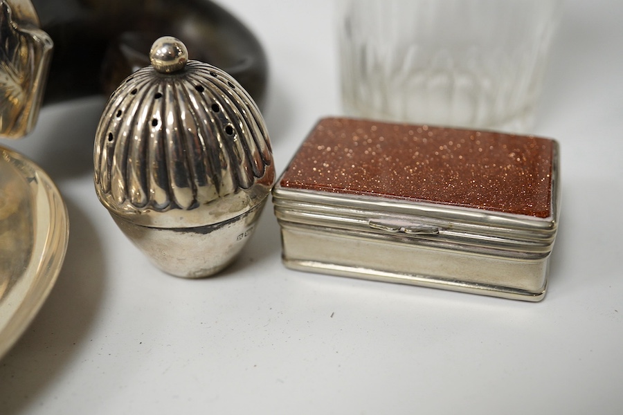 A 19th century white metal mounted horn snuff mull(split), 72mm, a small late Victorian silver cruet stand, a silver topped glass jar, a silver dish, small silver spoon and a white metal pill box. Condition - poor to fai